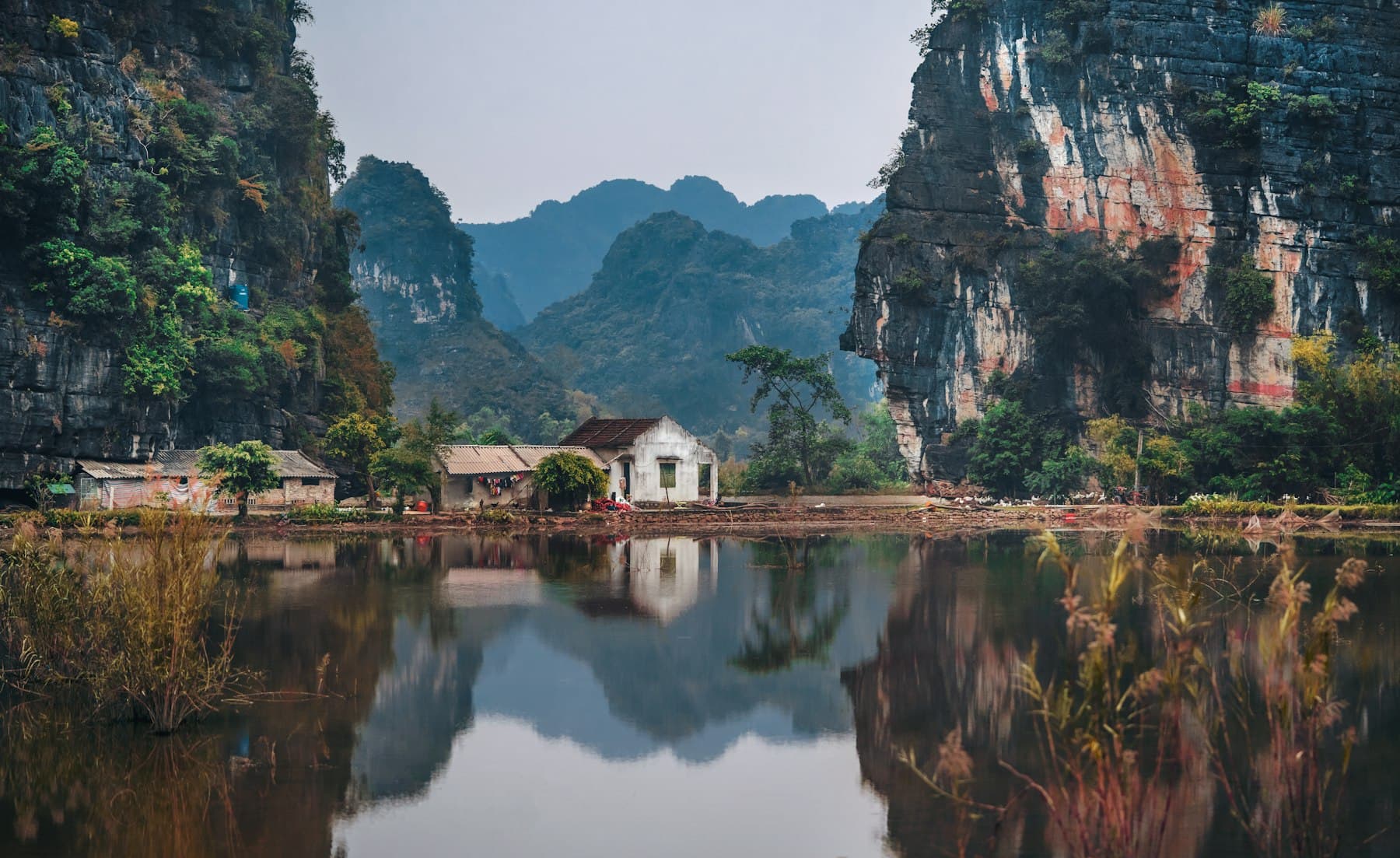 Karst mountains reflected in still water