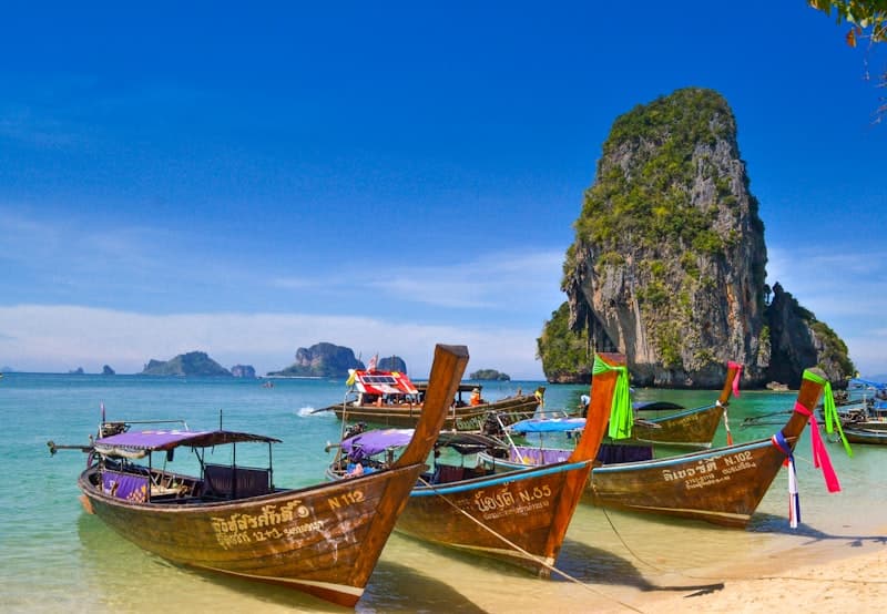 Longtail boats moored on a Thai beach